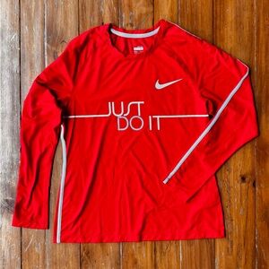 Nike women’s Red Long Sleeve with White Swoosh Dri Fit Size M